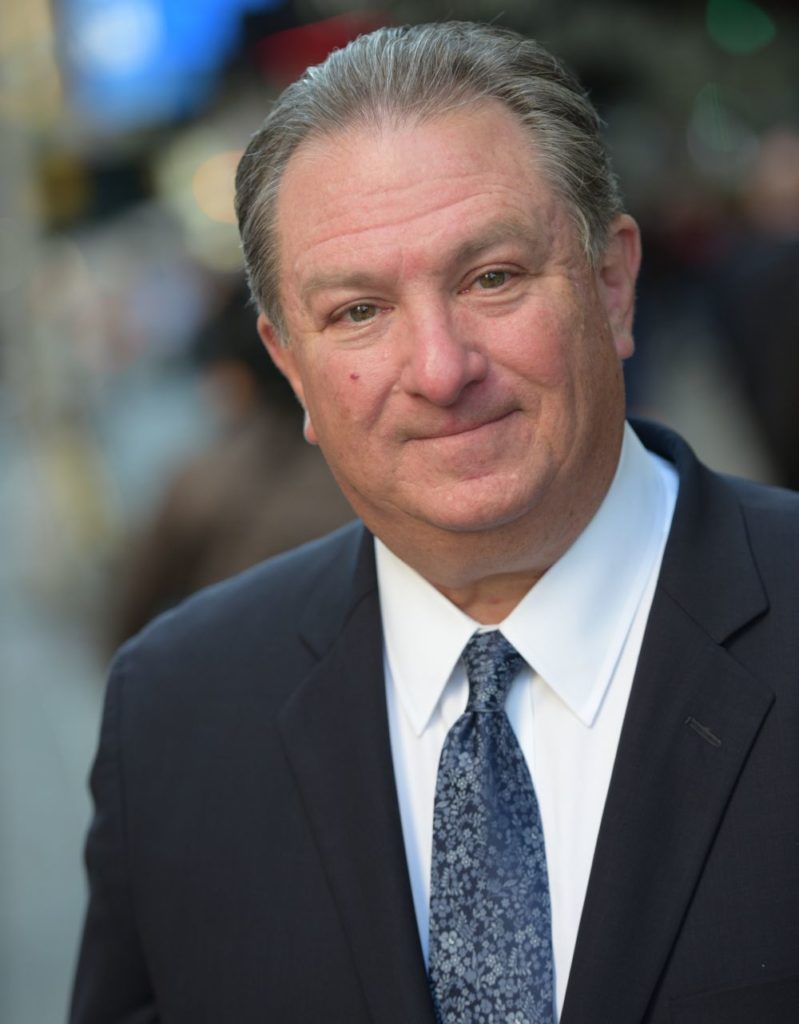 Mark Alterman in a Suit, Smiling Headshot